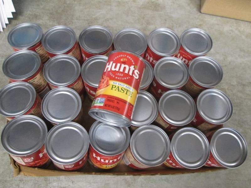24 6 Oz cans of Hunts tomato paste