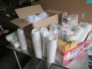 Large assortment of serving cups and lids