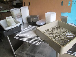 Plastic food containers and a stainless steel straw dispenser