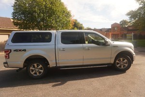 2019 Ford F-150 XLT 4 Door 4 x 4 Crew Cab Truck With Color Coordinated Topper