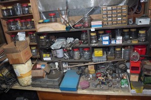 Contents of Counter - Fasteners, Sandpaper, Outboard Motor