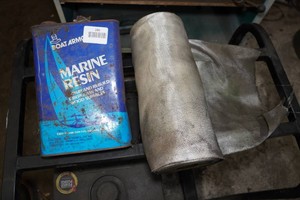Marine Resin and Roll of Fiberglass Cloth