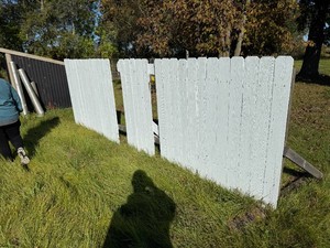 Cedar fence missing pickets are behind fence 5 x 15