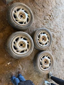 Saturn wheels  1856515 tires set of 4