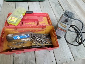 Lot of drill bits and sharpener