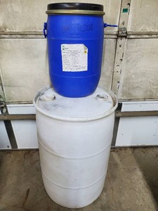 55 gallon plastic barrel and smaller sealed barrel