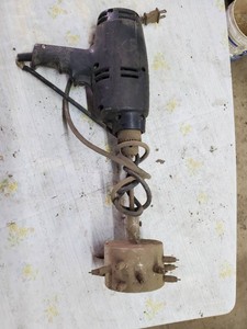 Drill with chicken plucker attachment