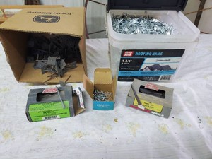 Lot of nails and screws including roofing, casing, masonry and insulation nails