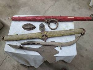 Random vintage items Sad Iron, horse collar, insulator, evener