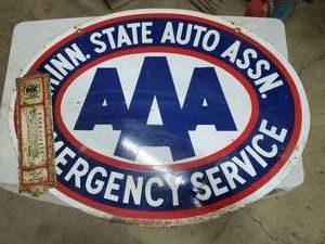 Triple A double sided sign and Northrup King thermometer