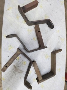 Camper stake pocket tiedowns