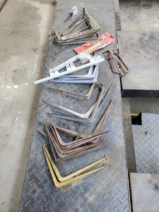Lot of shelving brackets,hooks and tool holder