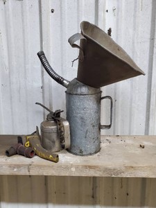 Lot of oil tools including funnelsoil canoilerspouts