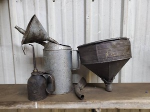 Lot of oil tools including funnelsoil canoilerspouts