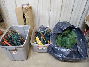 2 boxes of Christmas lights and decorations