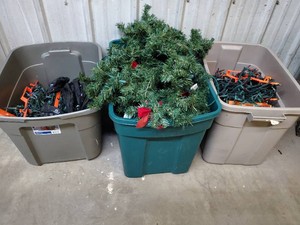 3 boxes of Christmas lights and garland