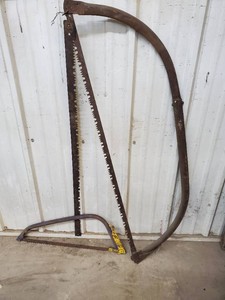 2 old bow saws and extra blade