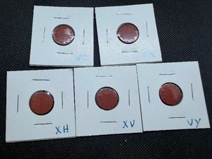 Five WWII Red Ration Tokens VC, VX, XH, XV, VY