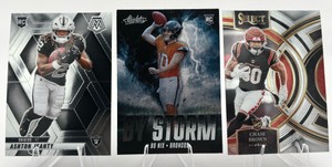 Lot of 3 Football Cards Including 2023 Panini Select Chase Brown RC #151, 2024 Panini Absolute Bo Nix By The Storm RC #BS-BNX, and 2025 Panini Mosaic Ashton Jeanty RC #345