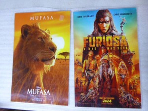 2 Movie Posters in Hard Plastic Holders