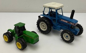 Miniature Die Cast Tractors Including Ford TW-5 And More Biggest Is 4 x 6