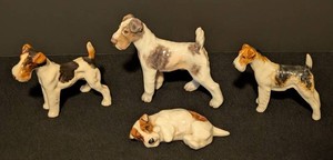 LR - Porcelain Fox Terrier Figurines - Royal Doulton (Lot of 4)