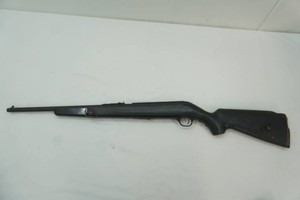 The lettering is very hard to read but it is a Berg and Son  no serial number but I can read LR after the model so I can only assume it is a 22 LR