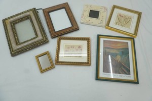 group of pictures and picture frames