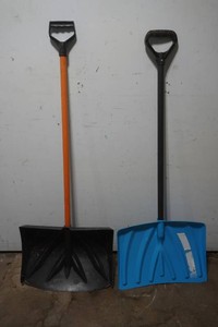 2 plastic snow shovels