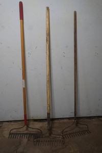 3 garden rakes
