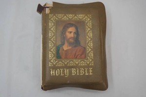 vintage Holy Bible with padded cover needs repair