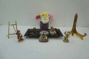 home decor including brass picture stands, artificial flowers, figurines, tray