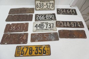 antique license plates dating 1925 to 1952 and one modern Collector plate