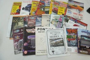 assortment of car enthusiast magazines, JC Whitney, Car Craft, Speedway, MACs and others