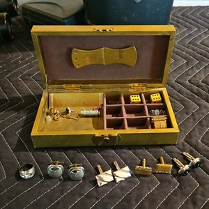 Jewlery box with cufflinks and various other jewelry