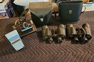 Binoculars, Polaroid color pack is and Argus reviewer VI