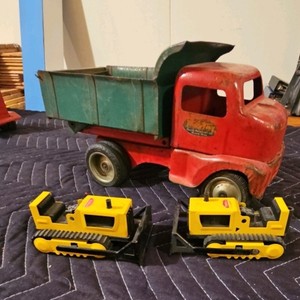 Tonka pressed steel dump truck and 2 tonka bulldozers
