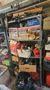 Contents of shelves and rack included