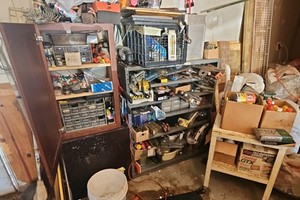 cabinet and 2 racks  back of garage