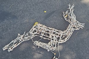 white wire-frame jumping reindeer outdoor Christmas decoration