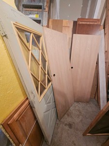 Lot of various doors, cabinets and wood