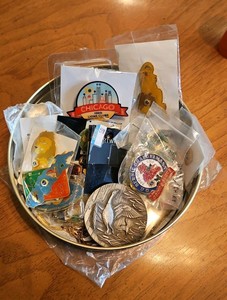 Tin of various pins