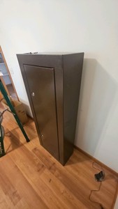 Gun cabinet with keys