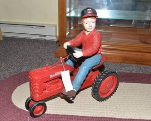 Case IH McCormick Farmall Child on Tractor Figurine