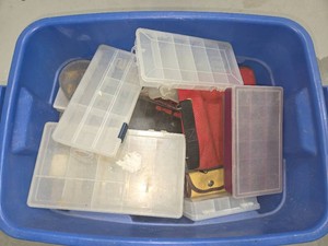 Tub of empty tackle storage boxes