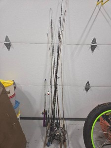 Lot of 11 old fishing rods