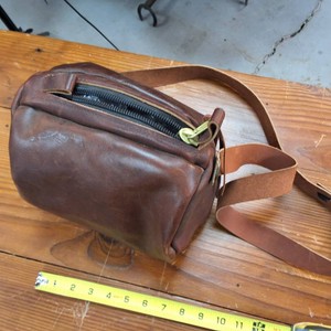 Small Tube like Hand Purse made with genuine leather