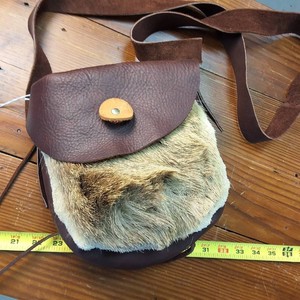 Custom made leather shoulder satchel with deer hide accent