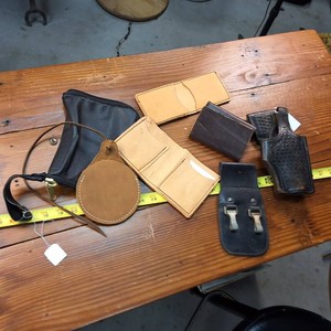 Large lot of misc. Leather Items - including a ball bag and wallets
