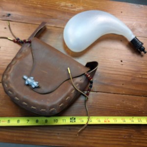 Empty Cantel Flask and sharp looking little unfinished hand bag